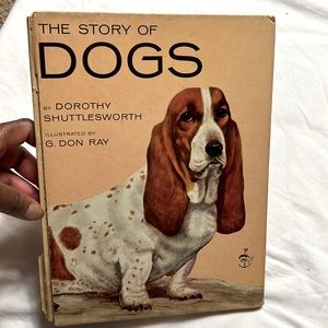 For Dogs lovers!The story of Dogs  book by Dorothy shuttlesworth rare used
